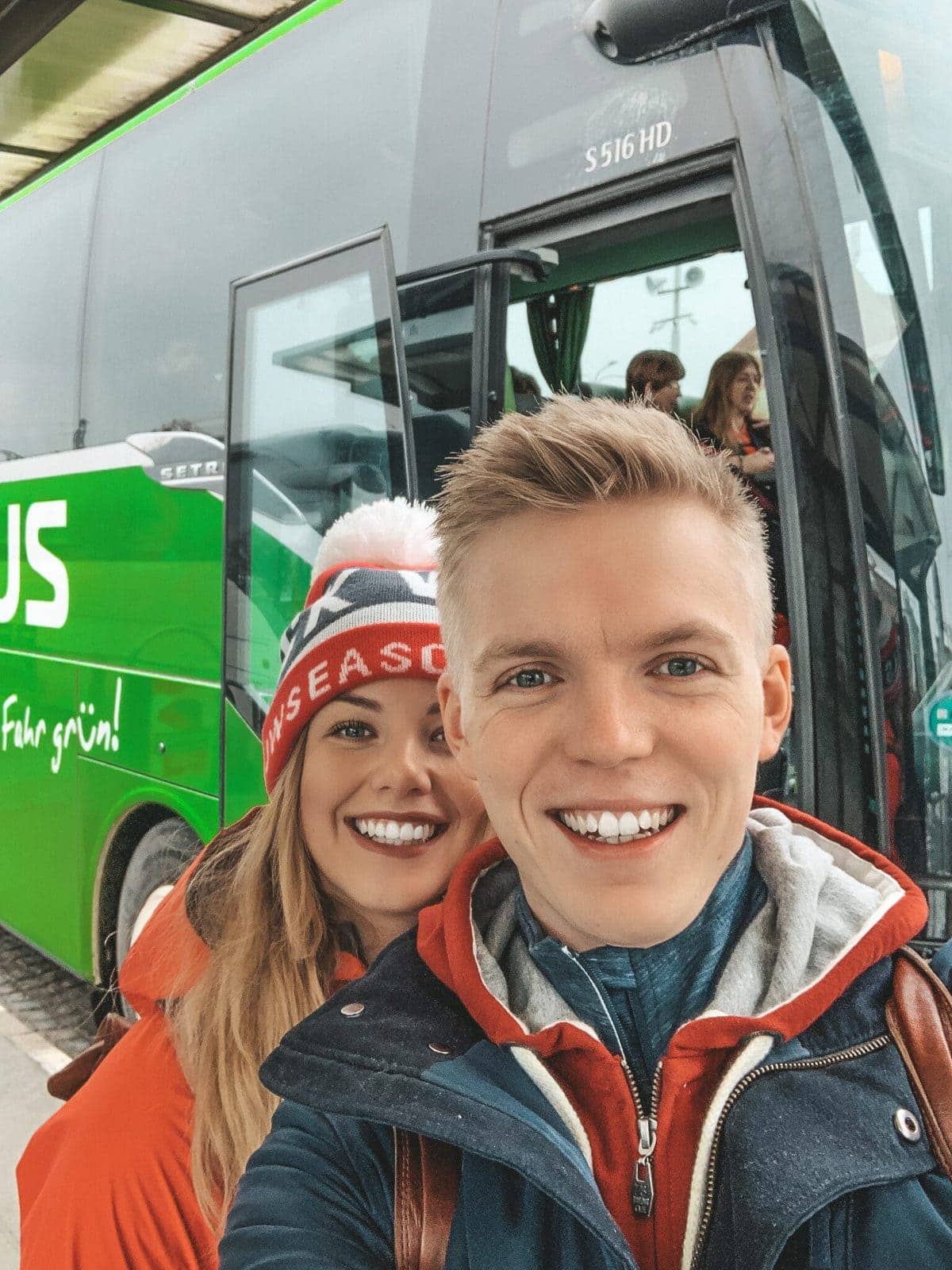 Lucka and Lukáš from Loudavým krokem with Flixbus in the background
